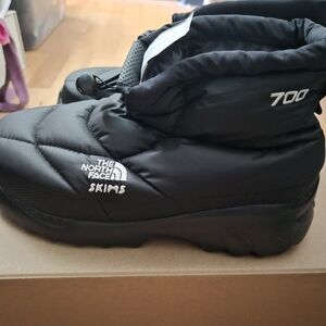 The North Face x Skims Black Puffer Boots